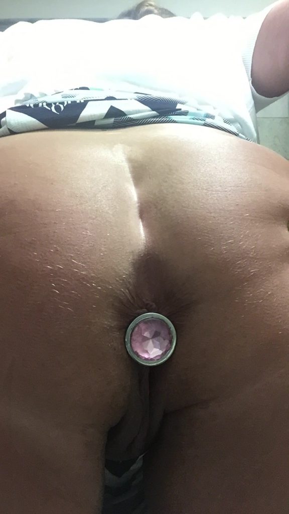 She managed to squeeze a large and very cold plug up her ass - leaving just this pretty jewel protruding.